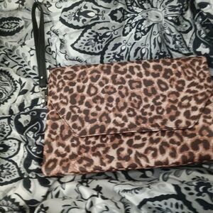 Used. Cheetah print clutch